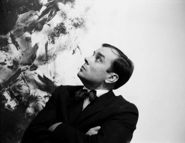 Portrait of Yves Klein in front of Anthropometry (ANT 76)